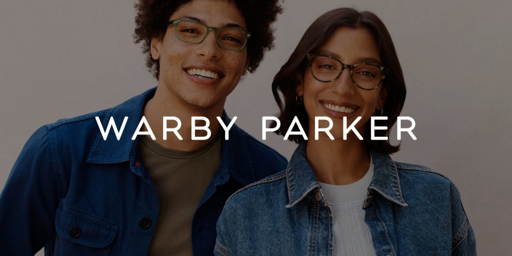 Warby Parker logo on top of an image of an attractive couple wearing stylish prescription eyewear.