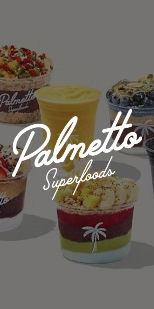 Assorted colorful smoothie bowls and tropical drinks from Palmetto Superfoods displayed against a white background with the Palmetto Superfoods logo centered over the image.